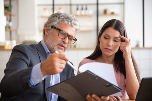 Family lawyer serving Etobicoke discusses legal options with client