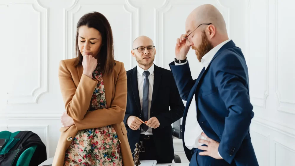 Distressed couple in a tense interaction, deciding between divorce vs. annulment